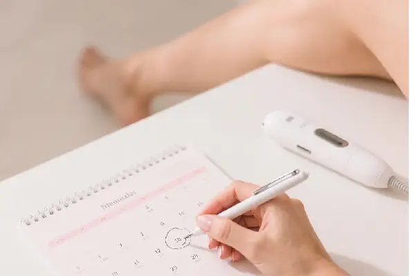 Calendário a marcar as sessões de depilação a laser em Gaia.